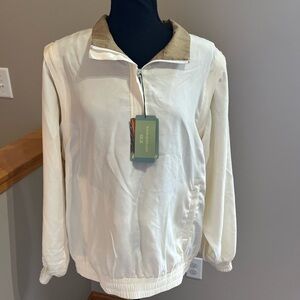 New 100% silk women’s Bobby Chan golf quarter zip jacket with zip off sleeves.XL